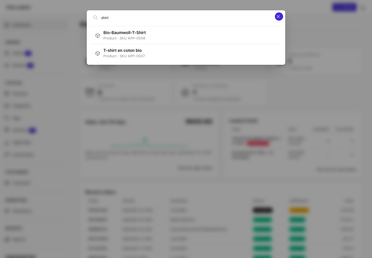 The command palette open over the dashboard with the search "shirt" listing two matching products by name and SKU