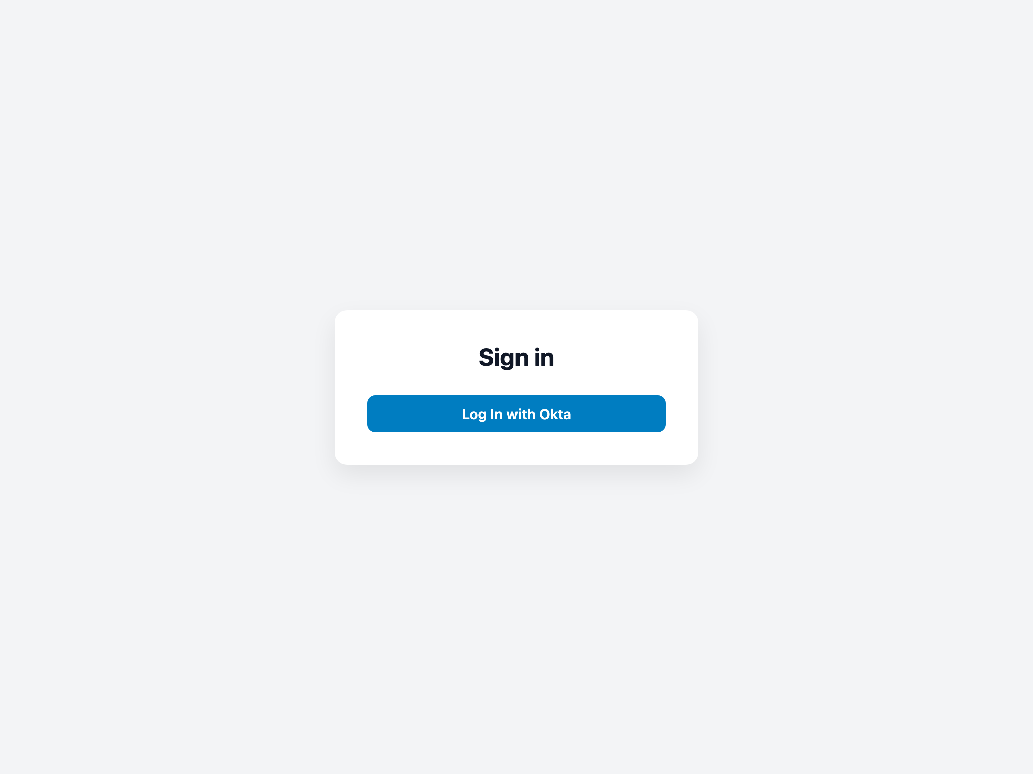A login screen with the Log In with Okta button