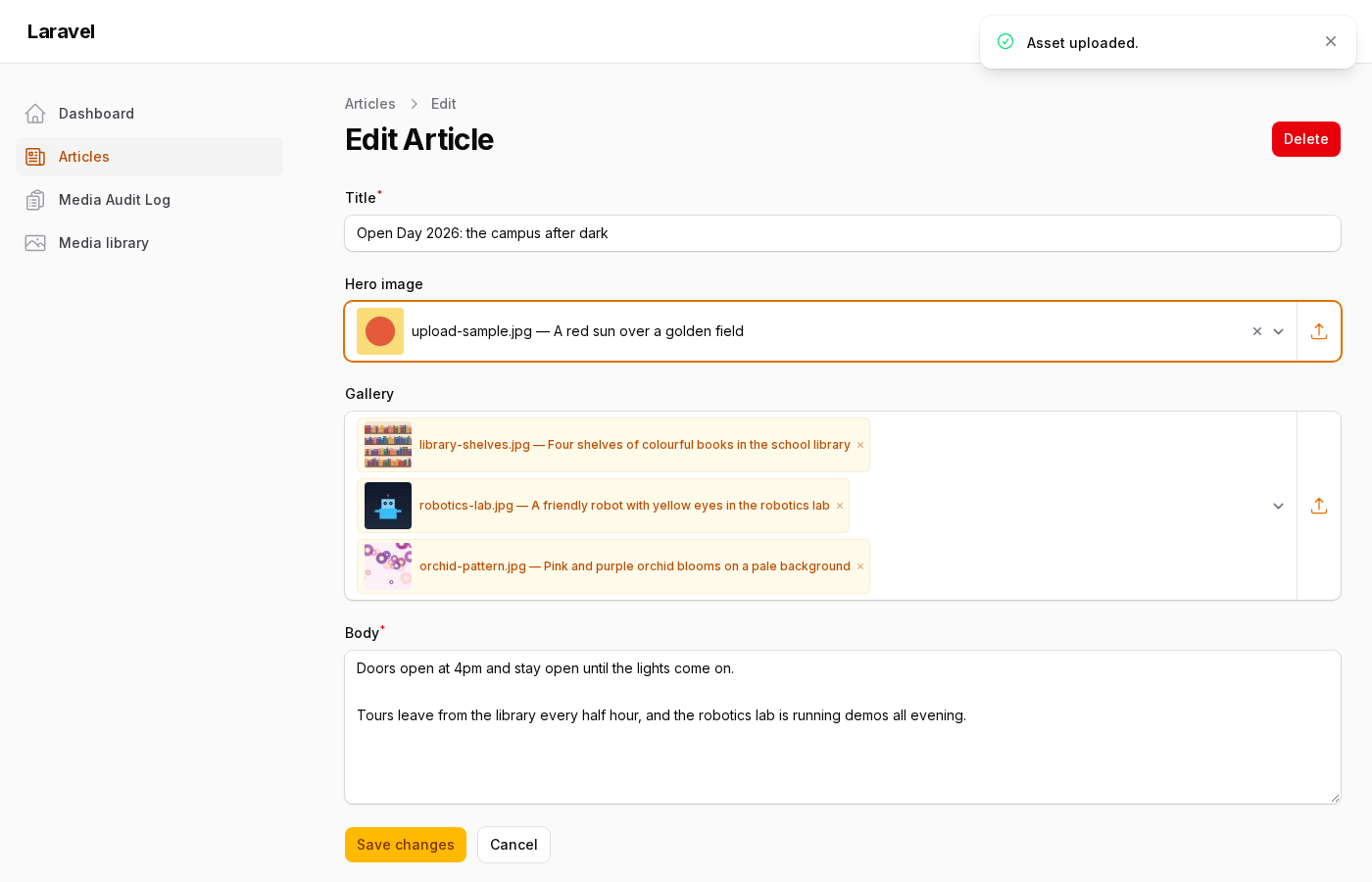 After the upload: the new image is selected, and a "Asset uploaded." notice shows