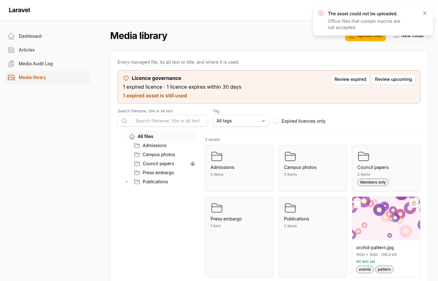 An upload refused: a Word file that contains a macro, with the notification explaining why