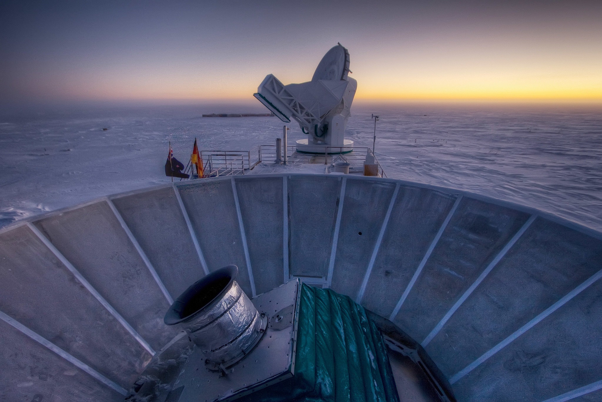 The Bicep2 telescope, in the foreground, was used to detect the faint spiraling gravity patterns 
            &mdash; the signature of a universe being wrenched violently apart at its birth.