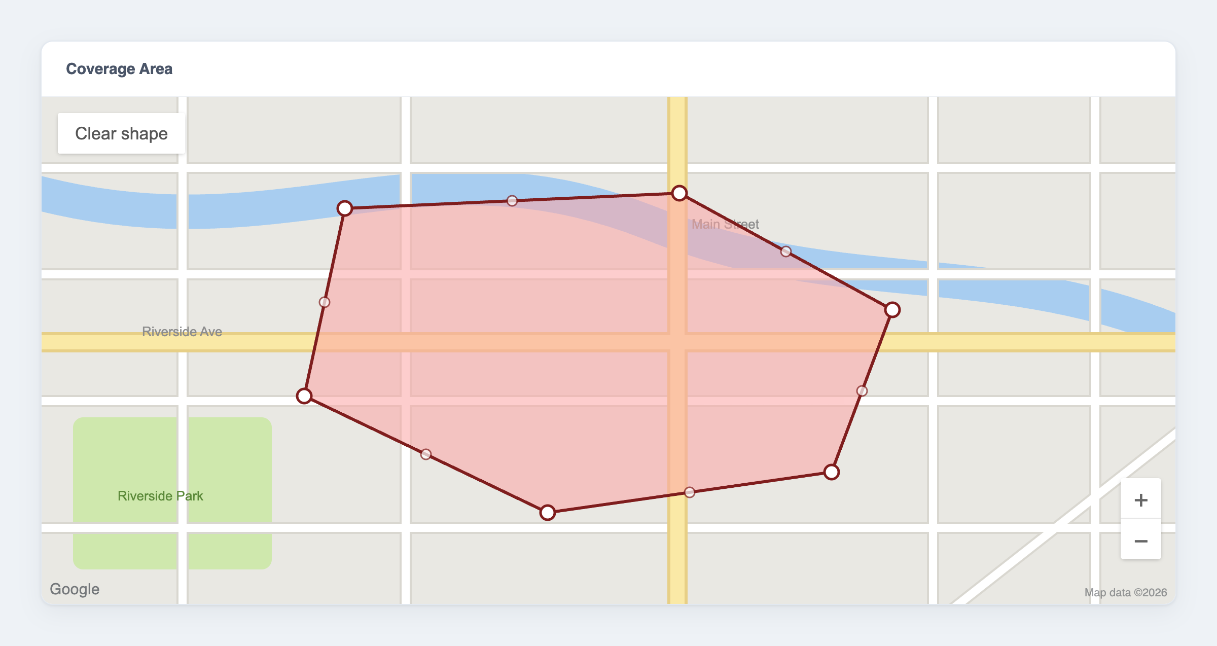 A polygon coverage area drawn on a Google Map inside a Nova form field, with draggable vertex handles and a Clear shape button