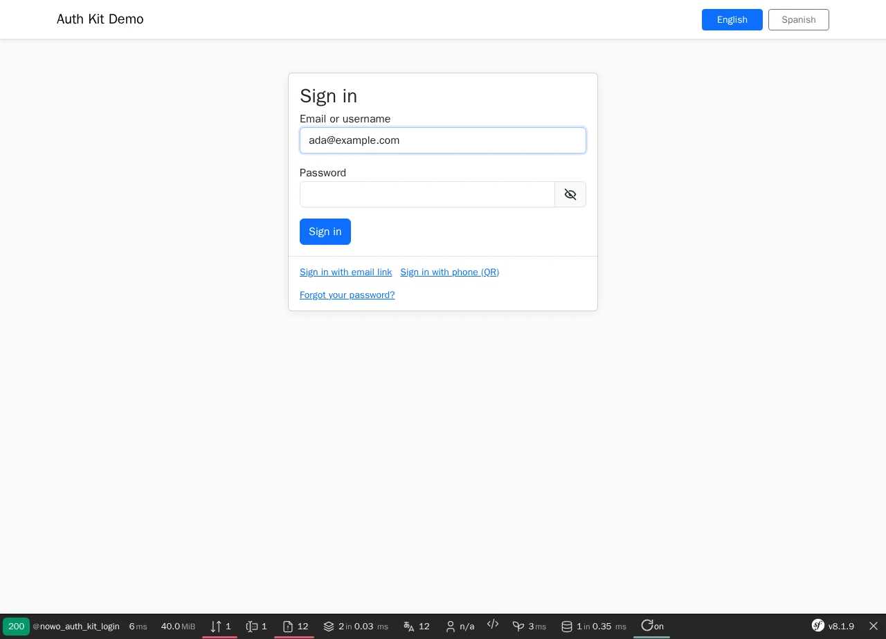AuthKit sign-in page in the demo: UiKit auth panel on the host guest layout (demo navbar with locale switcher), email and password with visibility toggle, Sign in button, footer links to magic link, QR phone sign-in and password reset, Symfony profiler toolbar
