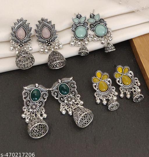 These stunning oxidized silver jhumkas feature vibrant red, green, and pink hues, perfect for festive occasions. Their intricate designs complement any outfit, adding a touch of elegance and tradition, making them an ideal accessory for celebrating in style - ZORA