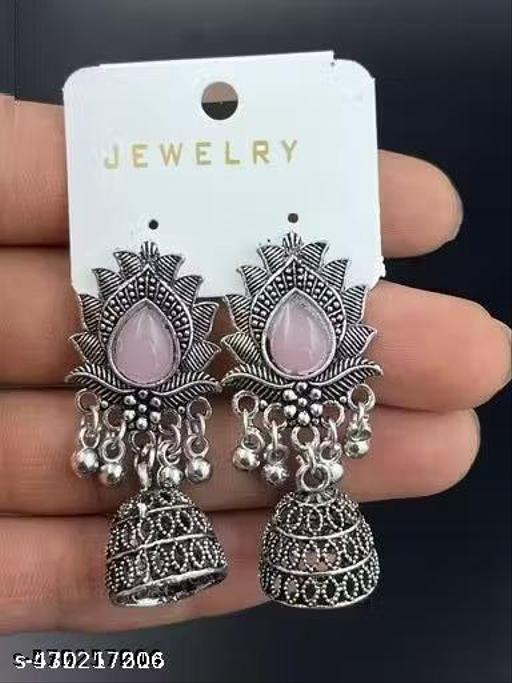 These stunning oxidized silver jhumkas feature vibrant red, green, and pink hues, perfect for festive occasions. Their intricate designs complement any outfit, adding a touch of elegance and tradition, making them an ideal accessory for celebrating in style - ZORA